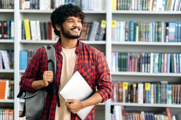 Student holding BCA notes from BCA Noteswala